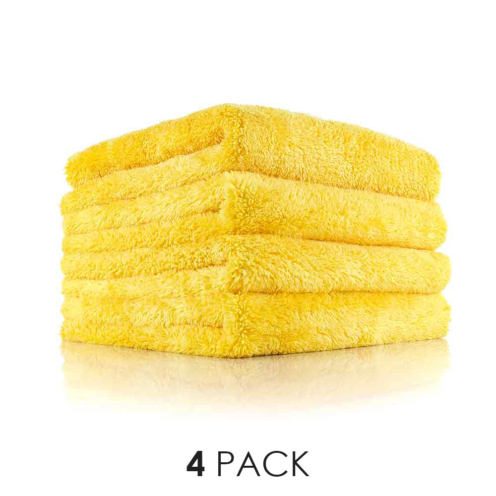 A picture of a 4-pack of yellow Eagle Edgeless towels from The Rag Company